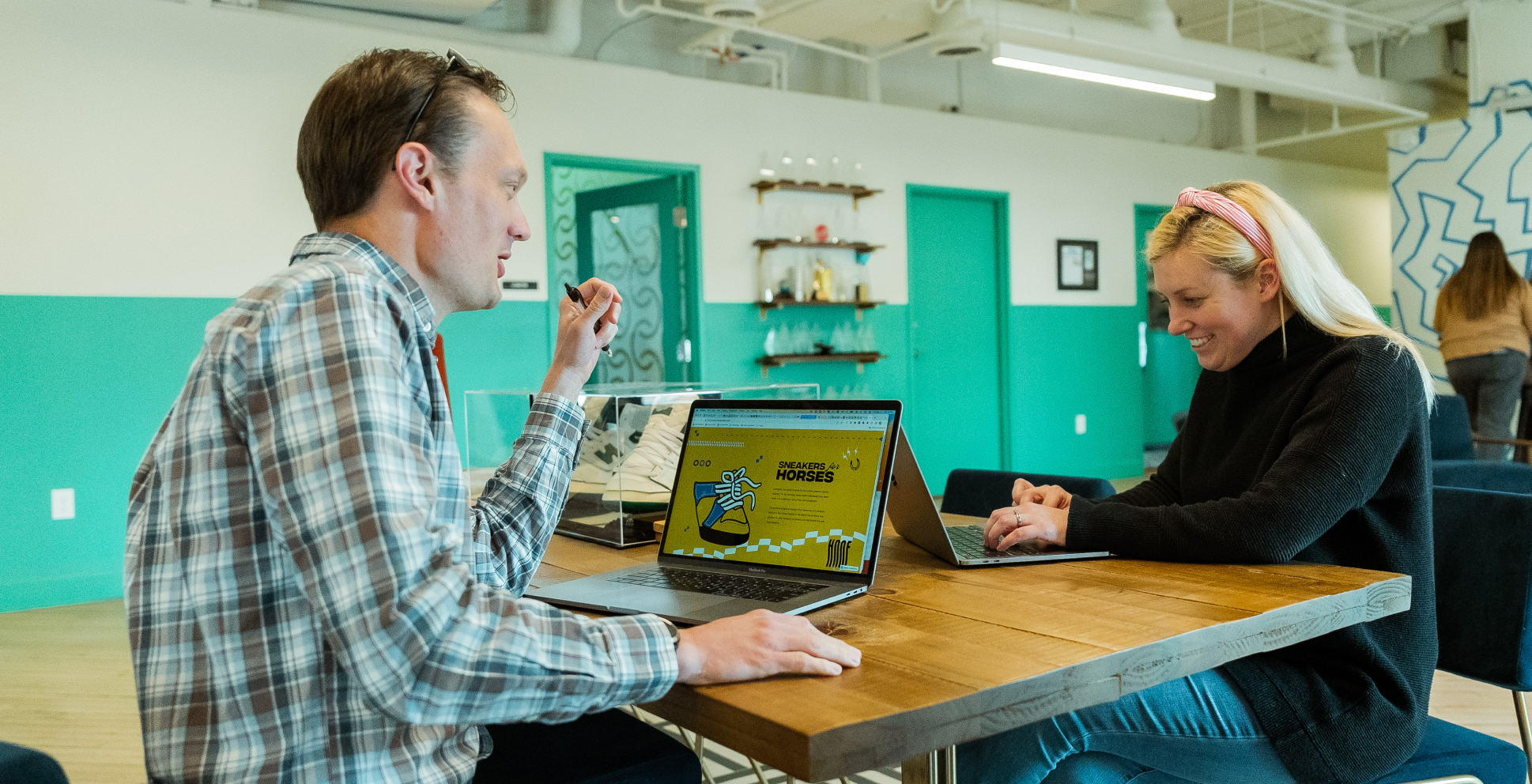 Cornett interactive team collaborating on website design.