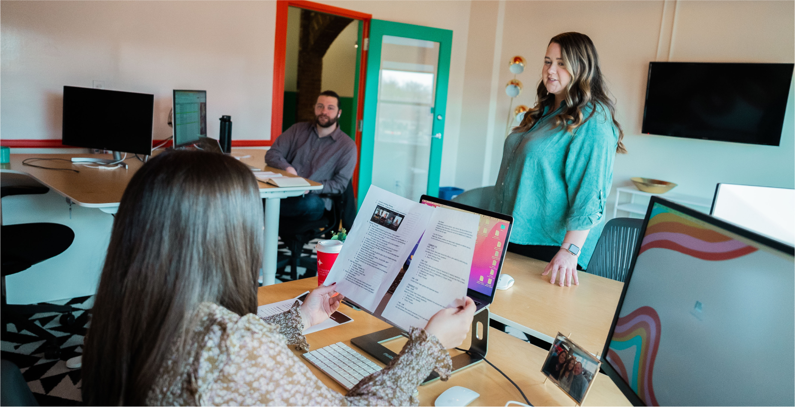 Cornett strategy team collaborating.